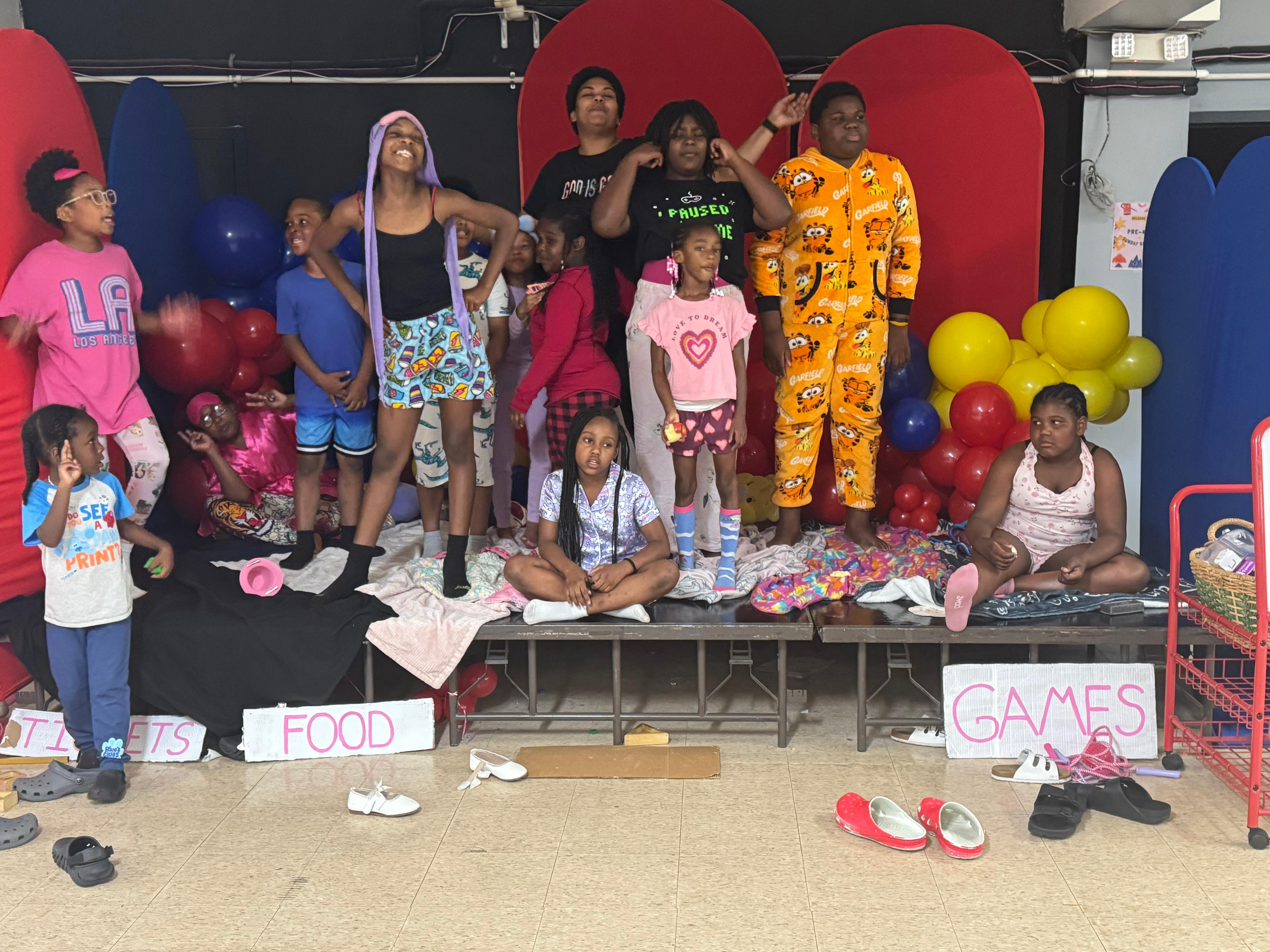 Summer celebration on stage — kids perform and have a blast together