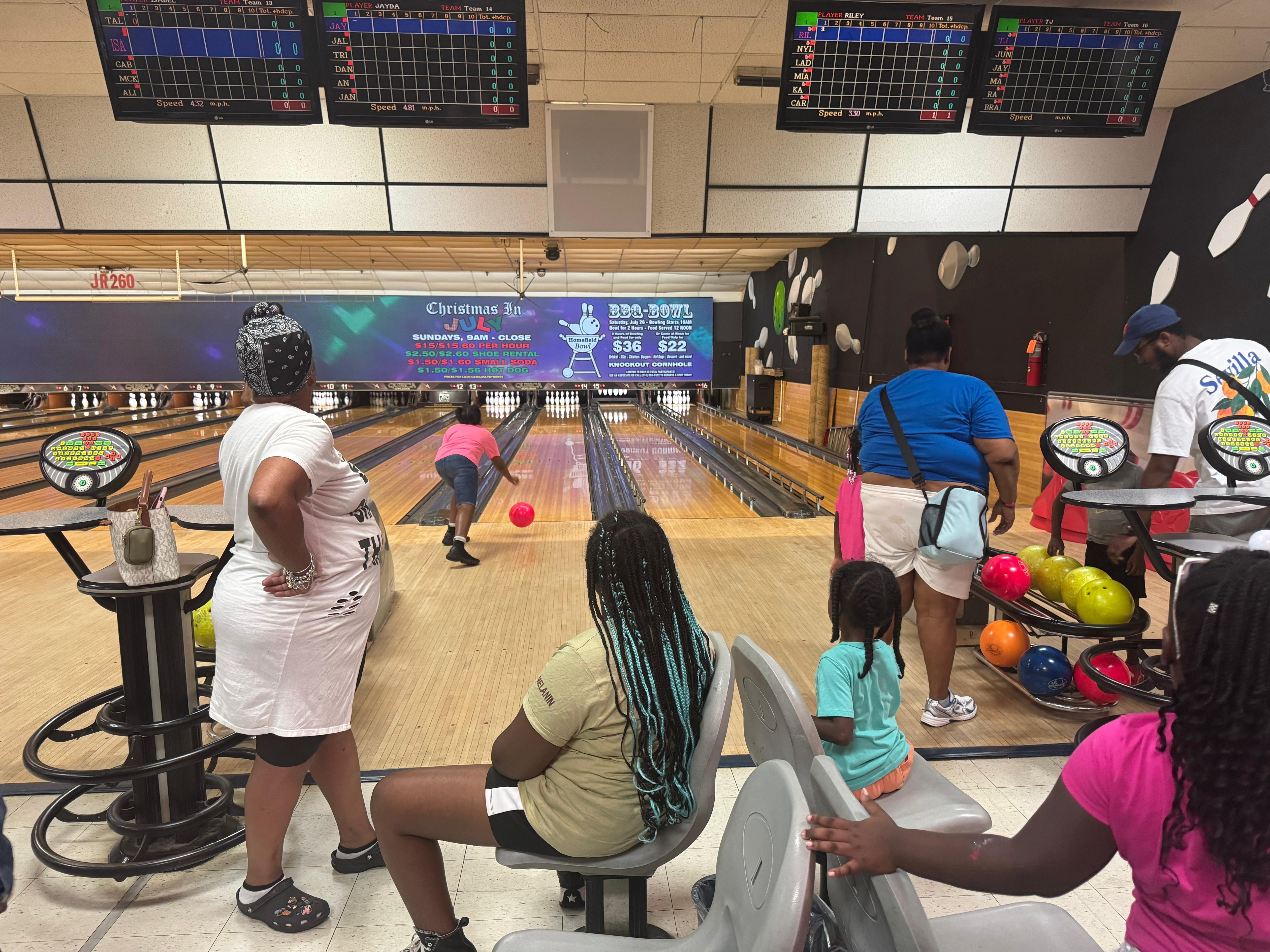 Bowling field trip — kids cheer each other on at the lanes