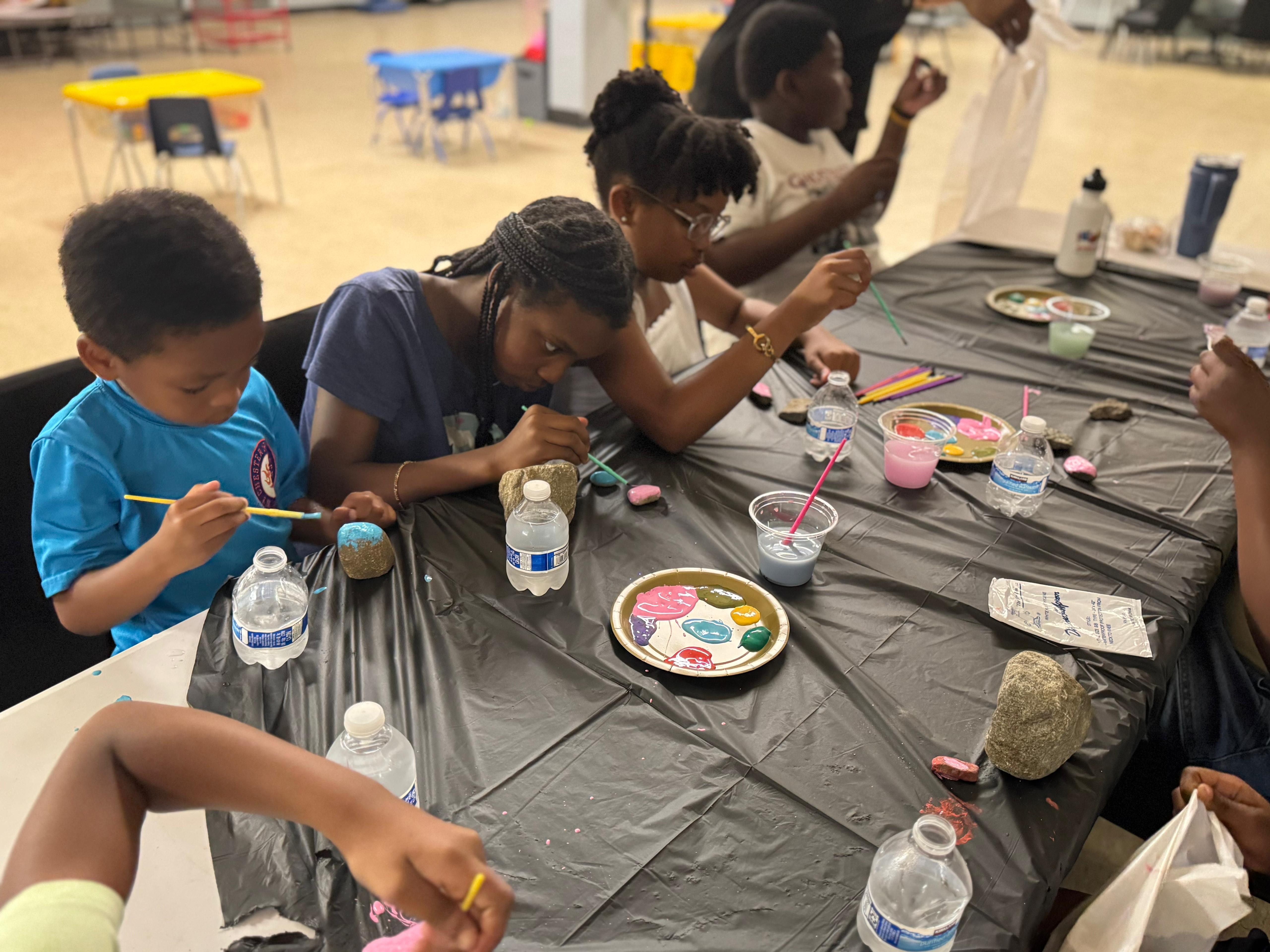 Rock painting — kids express their creativity with colorful designs